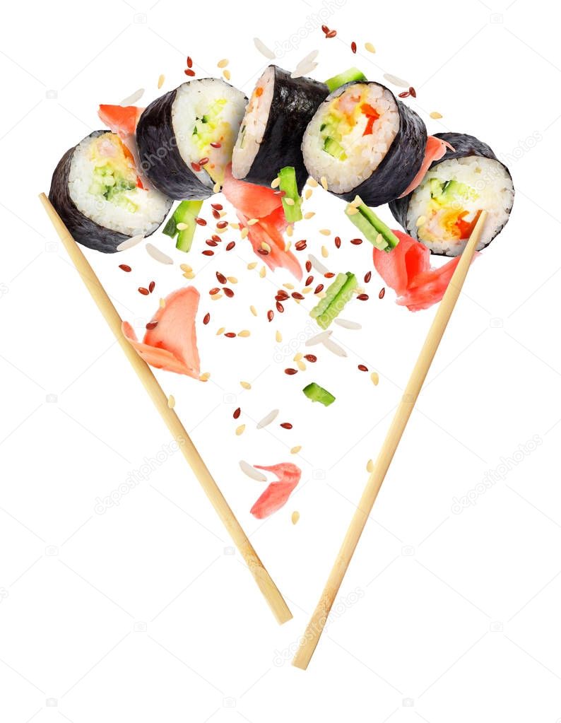 Sushi pieces with chopsticks close-up, isolated on white 
