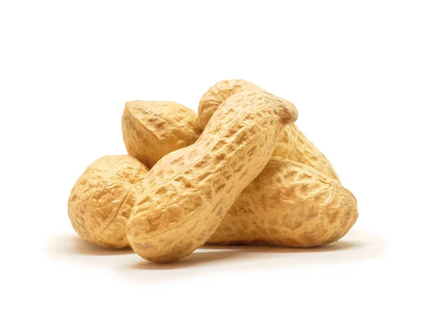 Mucchio di arachidi secche primo piano su sfondo bianco — Foto Stock