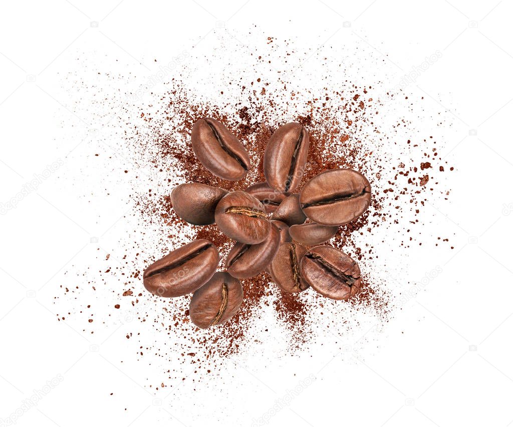 Coffee beans with ground coffee closeup, isolated on white 