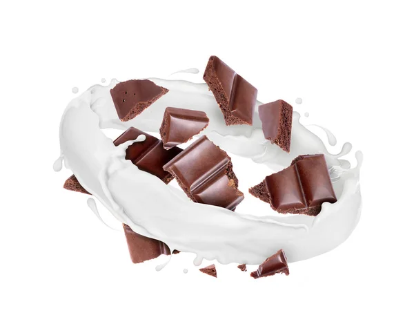 Pieces of porous chocolate are in splashes of milk on white — Stock Photo, Image