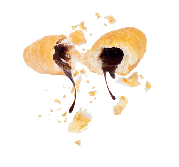 Schokolade aus zwei Hälften eines Croissants in Nahaufnahme — Stockfoto