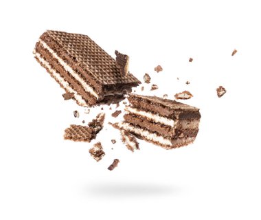 Chocolate waffles broken into two halves isolated on a white background 