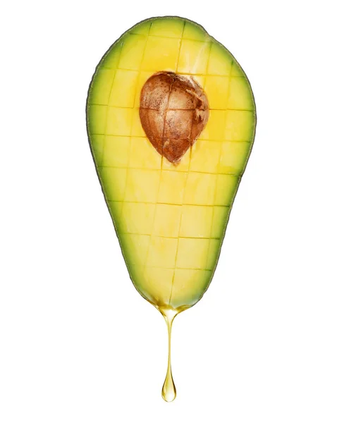 Goccia di succo sgocciolante dall'avocado, isolata su fondo bianco — Foto Stock