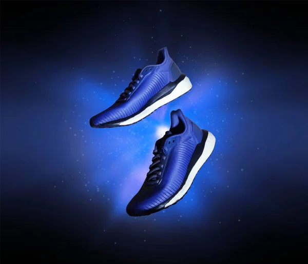 Technological Running Shoes Flash Blue Light Dark — Stock Photo, Image