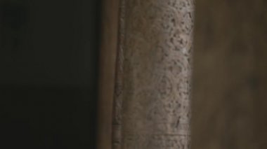 Wooden column architectural design moving focus from one element to another