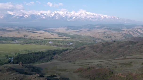 Aerial photography. Panoramic view of the snow ridge, clouds over the mountains. — Stok video