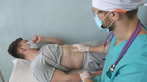 Doctor Exams Male Patient Covid Symptoms Medic Conducts Medical Examination — Stock Photo, Image