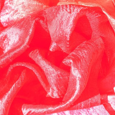Kırmızı ipek dokular arka plan. Seçici odak.