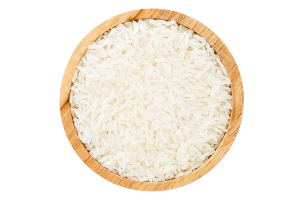 Cerrar cuenco de madera de grano de arroz de jazmín aislado sobre fondo blanco Fotos de stock libres de derechos