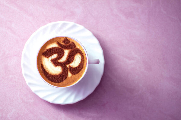 Top view of hot coffee cappuccino latte art in a ceramic glass