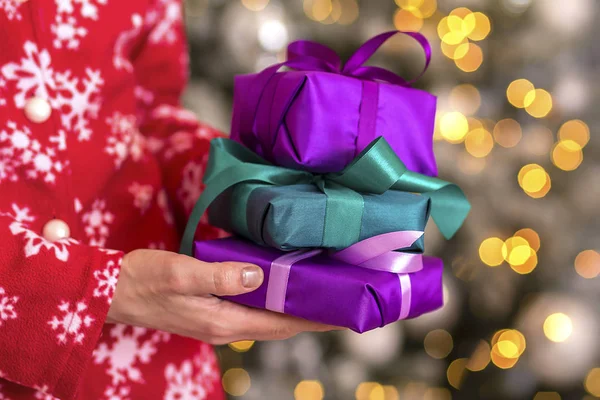 Christmas gifts in the hands of girl