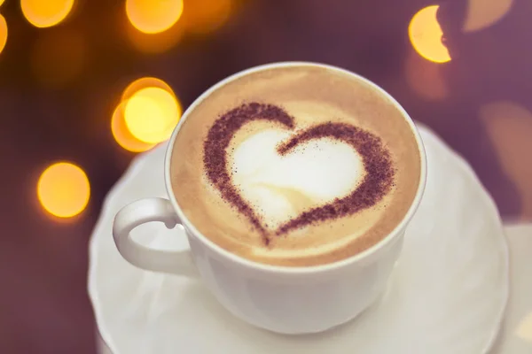 hot coffee cappuccino with latte art of romantic heart
