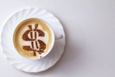 cappuccino kahve fincan resmi tarçın süt köpük üzerinde gelen bir dolar işareti olan