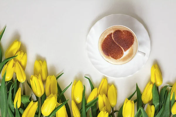 a cup of cappuccino coffee in a ceramic cup on the table