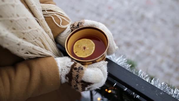 Girl is standing on the porch with a cup of tea — Stock Footage Girl Standing Porch Cup Tea Royalty Free Stock Video