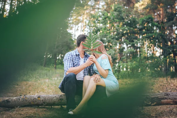 Camera Peeps Leaves Young Couple Stock Picture
