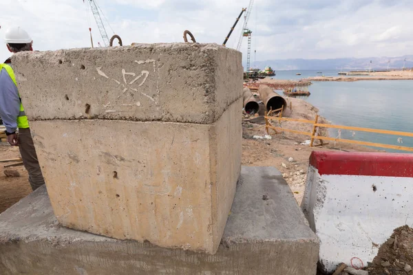 Aqaba, Jordan, 10/10/2015, Concrete building block being used in the foundation construction at the Aqaba new port