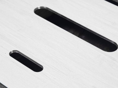 fütüristik paslanmaz çelik lazer metal cutout bir rustik backgrouund üzerinde