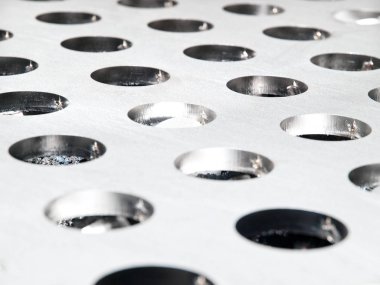 fütüristik paslanmaz çelik metal, rustik arka plan üzerinde lazer kesim