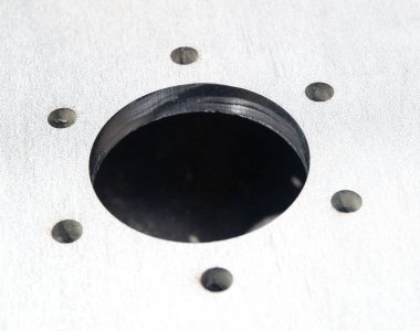 fütüristik paslanmaz çelik metal, rustik arka plan üzerinde lazer kesim