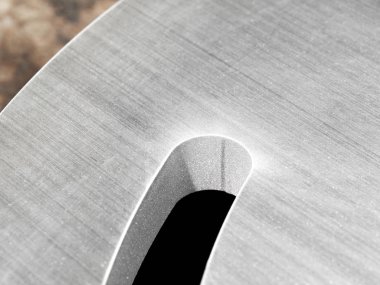 fütüristik paslanmaz çelik metal, rustik arka plan üzerinde lazer kesim