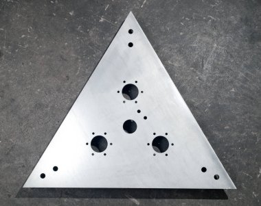 fütüristik paslanmaz çelik metal, rustik arka plan üzerinde lazer kesim