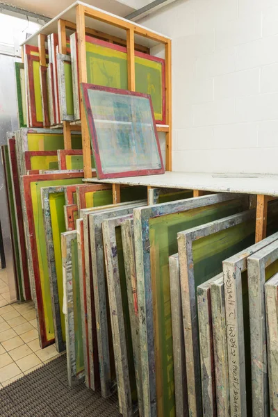 Silk Screen Printing Screens Stored Wooden Rack Ready Printing Stock Photo  by ©danny.dannyallison.co.uk 141393824