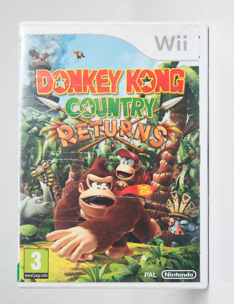 London, england 05/052019 Nintendo wii donkey kong country returns games on a white isolated background. iconic retro vintage video gaming machine. Japanese technology family gaming fun.