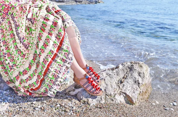 Greek model advertises bohemian sandals and clothes at the beach — Stock Photo, Image