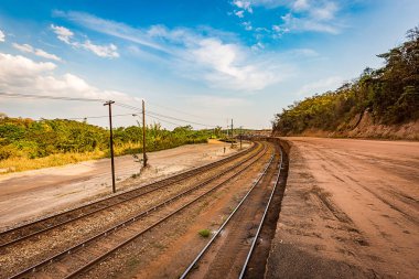 Railtrack crossing the mountains. Minas Gerais, Brazil.  clipart