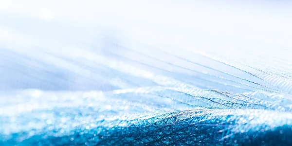 Blue synthetic fabric, fashion industry background — Stock Photo, Image