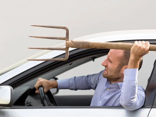Armed and aggressive driver — Stock Photo, Image