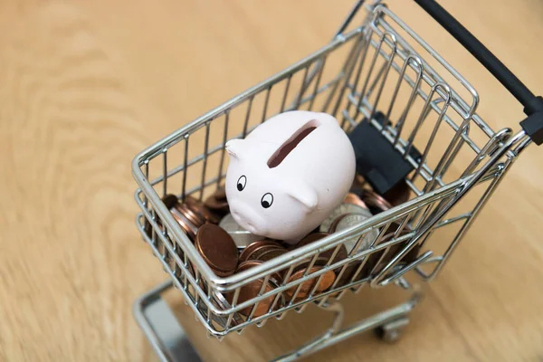 Happy Piggy Bank Shopping Cart Full Dollars — ストック写真