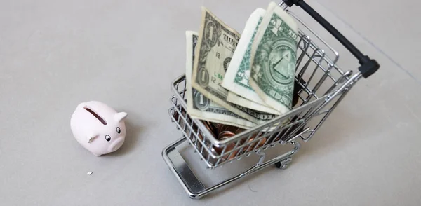 Happy Piggy Bank Shopping Cart Full Dollars — ストック写真