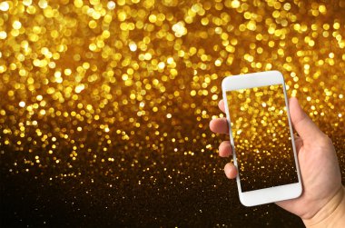 akıllı telefon bulanık bokeh ışıklar resim çekmek tutan el 