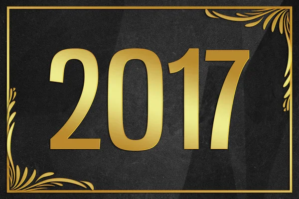 Золотое слово 2017 года на чёрном морщинистом бумажном фоне — стоковое фото