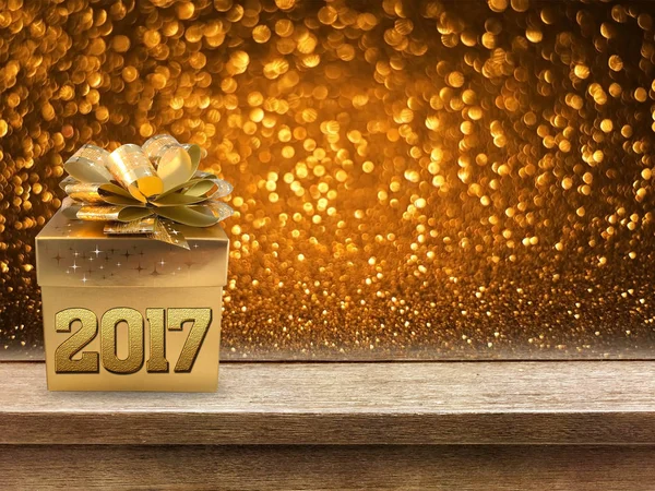 Gold-Geschenkbox und Band mit Wort 2017 auf Holztisch, Bokeh Bac — Stockfoto