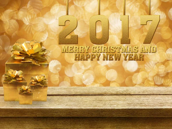 Feliz Navidad y Feliz Año Nuevo 2017 y cajas de regalo en madera — Foto de Stock