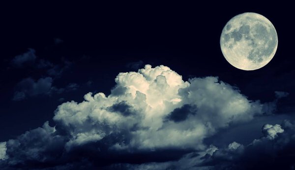 Night sky and a full moon in the cloud