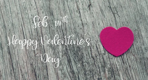 14 février Happy Valentine's Day mots sur fond en bois w — Photo