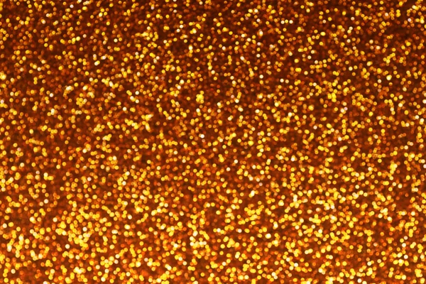Brillante oro difuminado brillo bokeh fondo abstracto — Foto de Stock