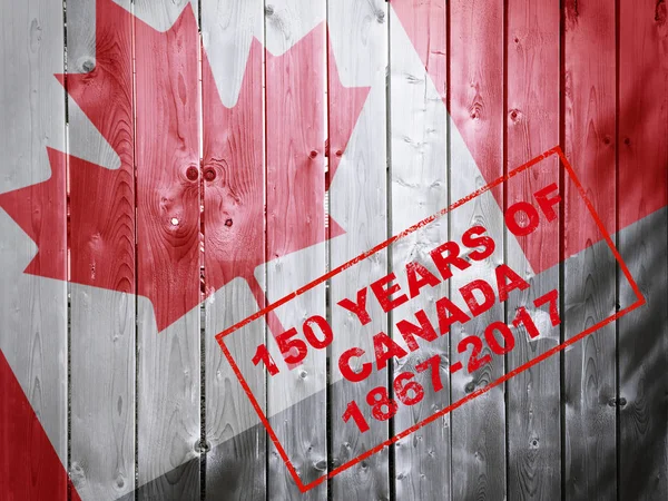 150 jaar van Canada 1867-2017 rode stempel woorden op houten CHTERGRO — Stockfoto