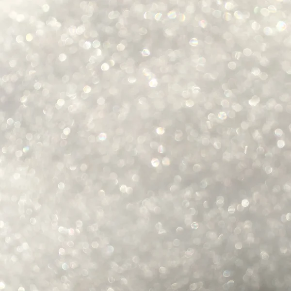 Silber glitter Bokeh aus Neuschnee abstrakte Textur Hintergrund — Stockfoto