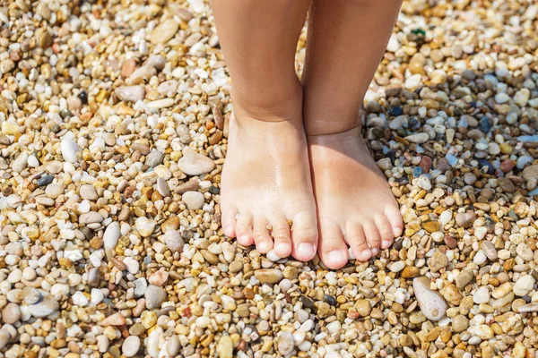 Little girl feet on beach — Stock Photo © tarafoto #57289567