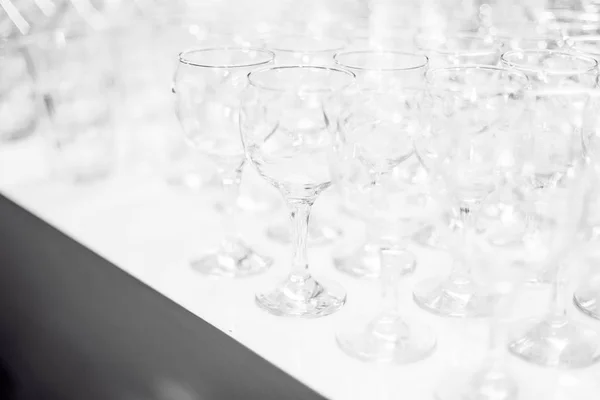 Transparent glasses in a row — Stock Photo, Image