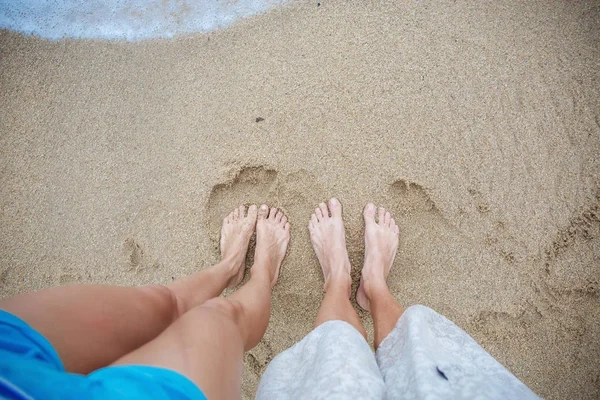 Benen på sanden — Stockfoto