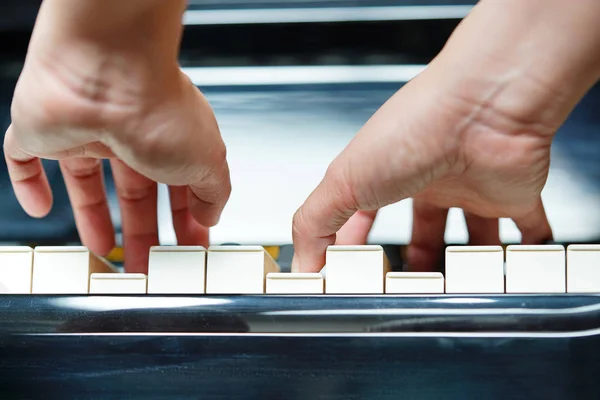 Scene of pianist hands from underneath. — Stock Photo, Image