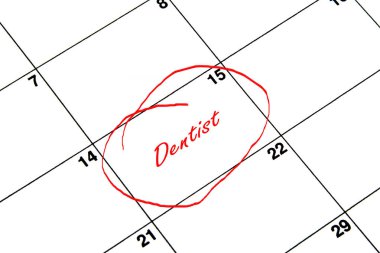 Bir takvim kırmızı daire içinde diş hekimi