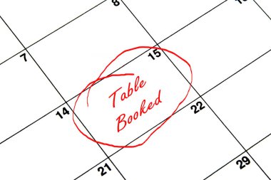 Tablo bir takvimi kırmızı daire içinde ayırtıldı