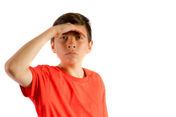 Young teenage boy isolated on white shielding his eyes — Stock Photo, Image